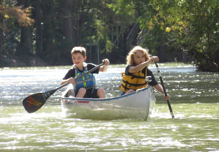Children Canoeing With Paddle With Style