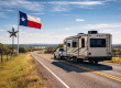 RVs set up along the river at Pecan Park Riverside RV Park during a comfortable January day in Central Texas